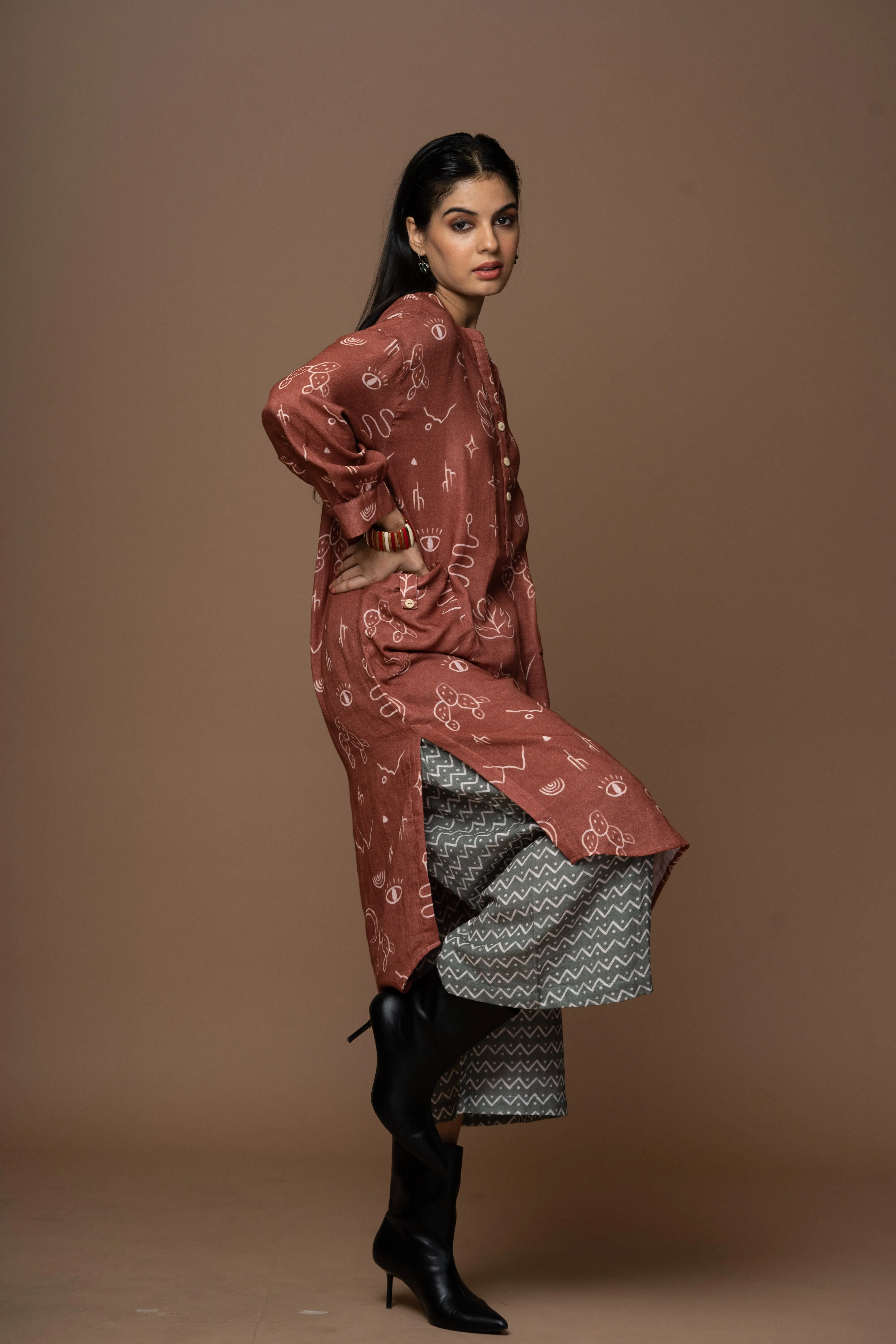 Deep Rust Dara Kurta in the Passing Through Pattern