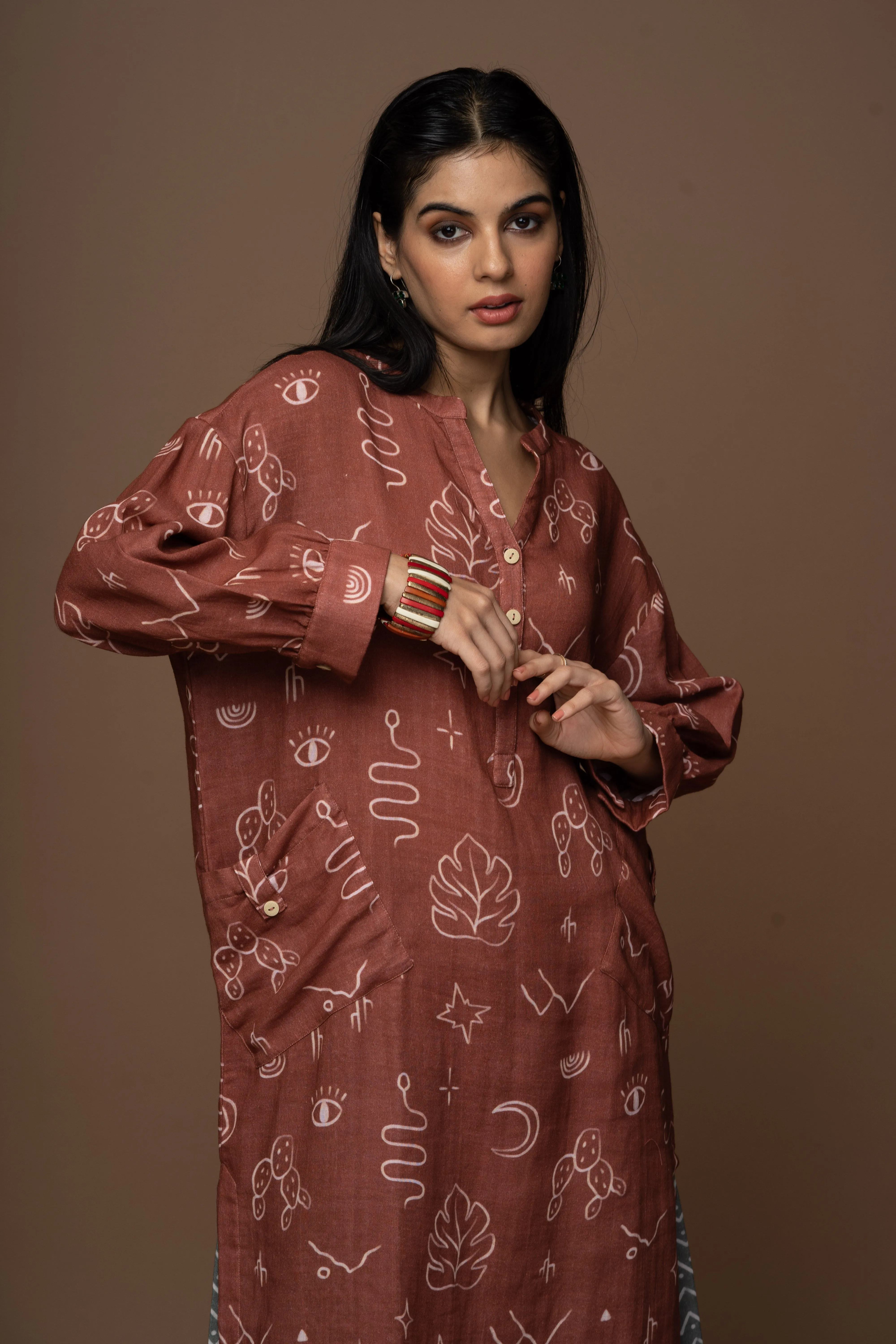 Deep Rust Dara Kurta in the Passing Through Pattern