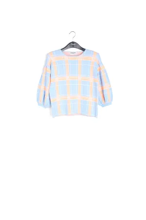Light blue puffed sleeve knitted top with check motif