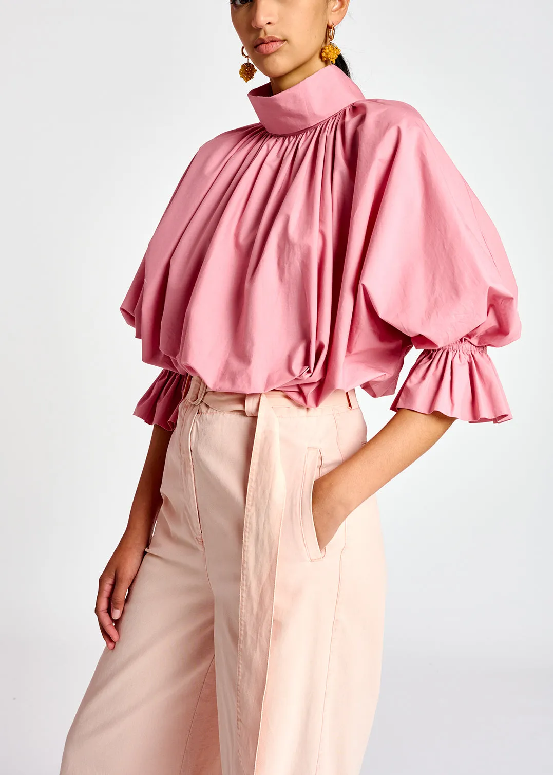 Light pink voluminous cotton top with high collar